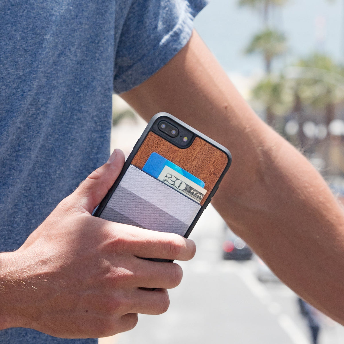 Man holding JIMMYCASE iPhone Wallet Case